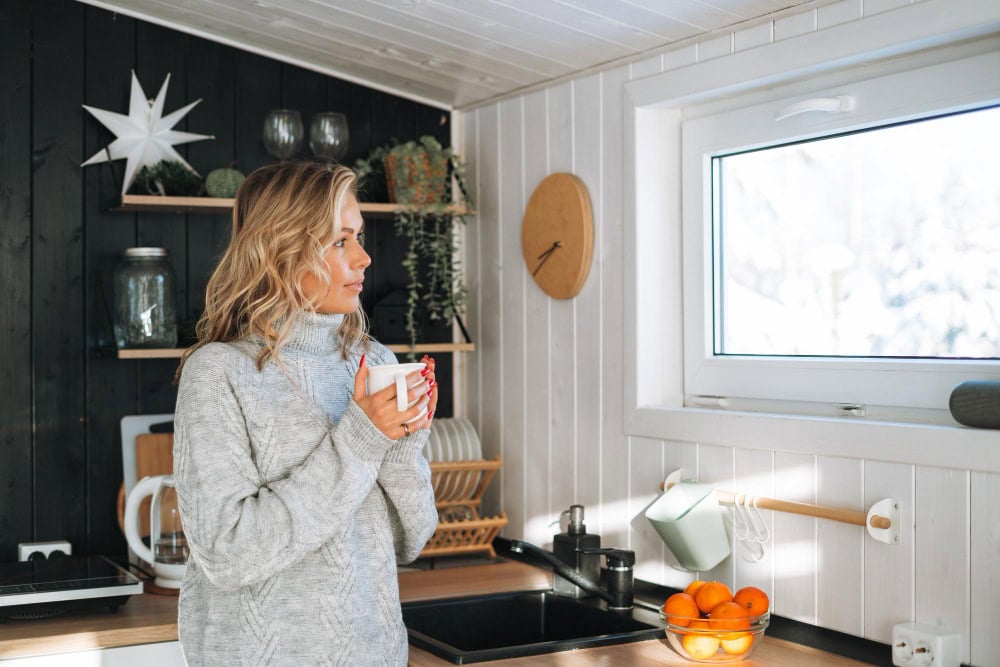woman holding a mug