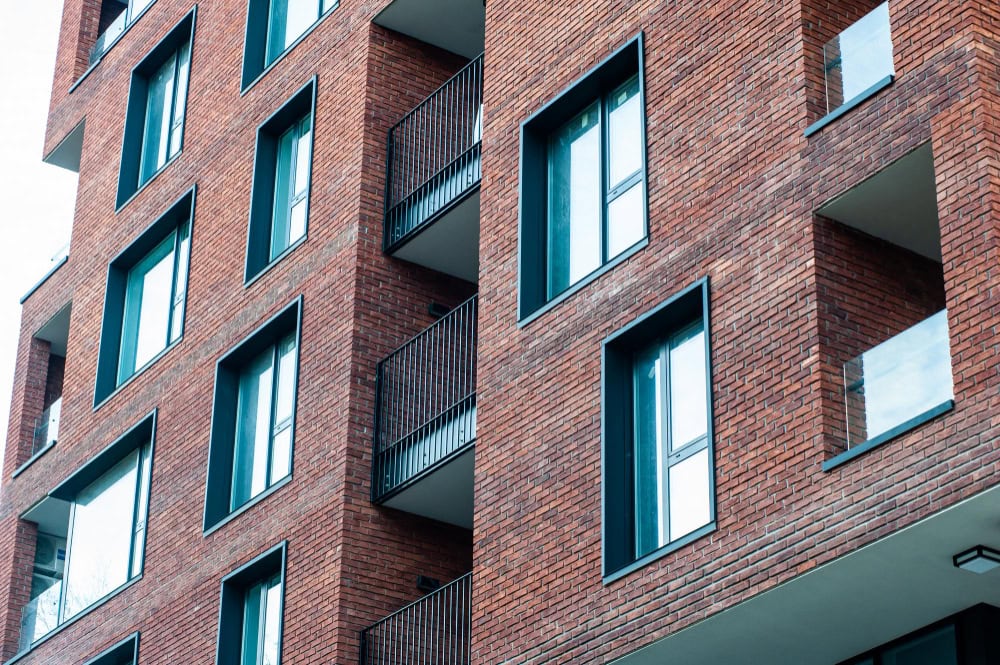 Modern apartment building within a UK housing development